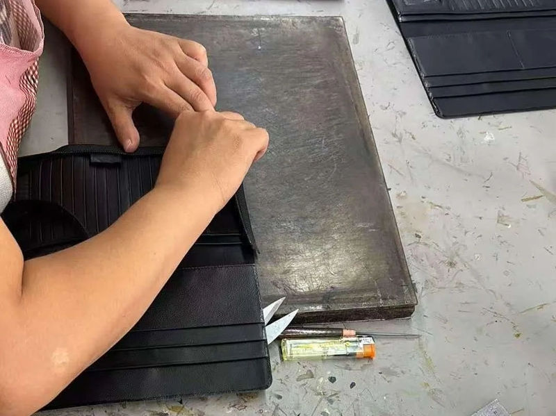 Godere, cüzdan sevkıyatından önce hangi kalite denetimlerini gerçekleştiriyor?